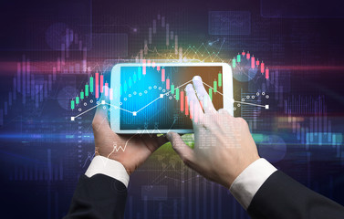 Hand touching tablet with worldwide reports links and statistics concept
