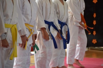 Black and colored belts of judo and martial arts