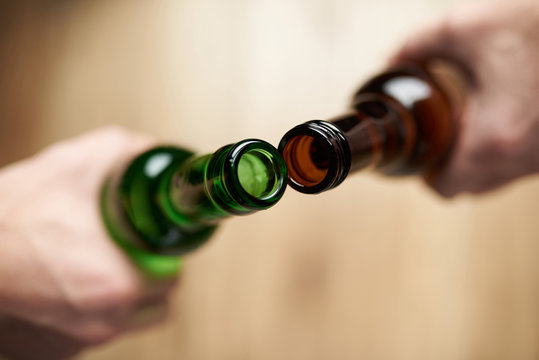 Close-up Of Green And Brown Beer Bottles