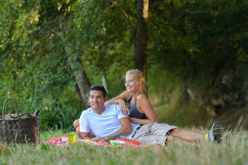 young man and woman at picnic