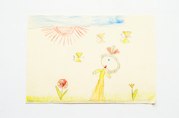 children's drawing in pencil. creativity on paper. girl walking on the field red sun and flowers