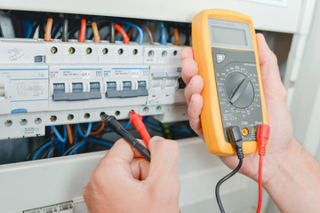 Probes of multimeter in fusebox