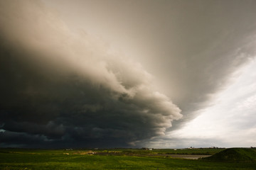 Obraz na płótnie Canvas Storm clouds moving in over the Iowa prairie