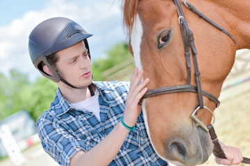 young rider with horse