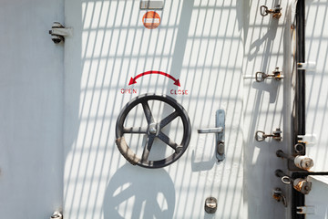 Water tight door on a ship of the boat with lock wheel into the boat.