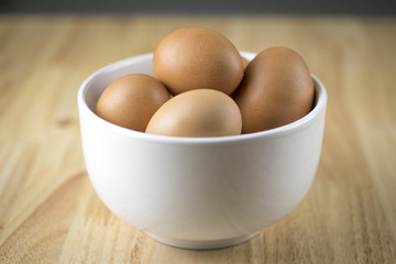 Eggs in Bowl on Butcher Block Table