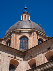 Fototapeta na wymiar The Renaissance brick dome of the cathedral of Urbino, Italy.