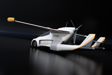 Rear view of futuristic autonomous car on black background.Flying car concept. 3D rendering image.