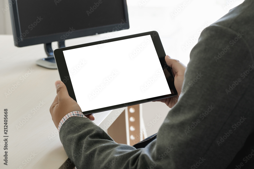 Poster digital tablet computer close up man using tablet hands man multitasking with isolated screen