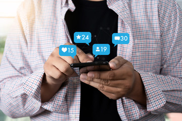 Young man using smart phone Social media and social network Marketing  concept People Connection