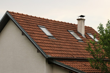 Roof with windows on the attic floor