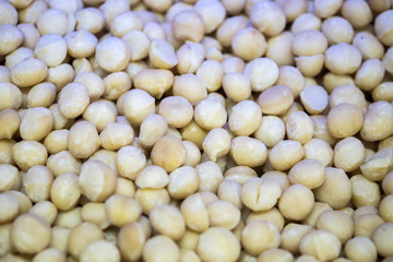 Backround of new harvest Macadamia nuts for sale at the city market