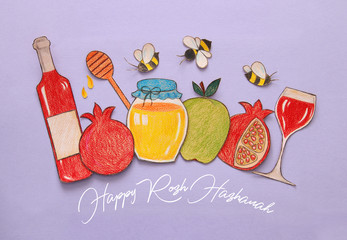 Rosh hashanah (jewish New Year holiday) concept. Traditional symbols shapes cut from paper and painted.