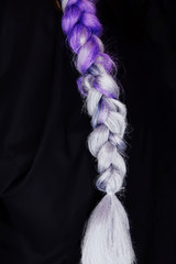 purple color braid samples. Braiding with synthetic purple color kanekalon pigtails.