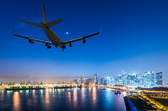 Airplane Landing In A Night City