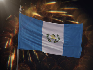 Flag of Guatemala with fireworks display in the background