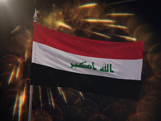 Flag of Iraq with fireworks display in the background