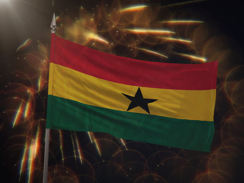 Flag of Ghana with fireworks display in the background