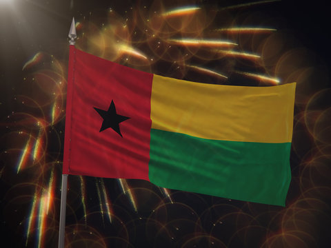Flag of Guinea-Bissau with fireworks display in the background