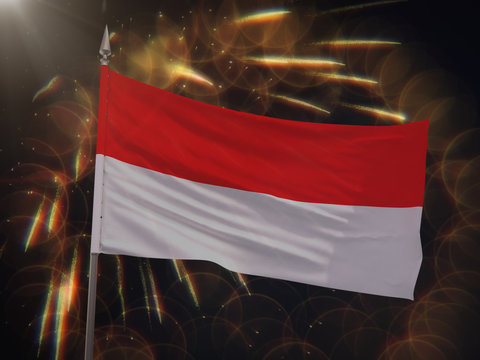 Flag of Indonesia with fireworks display in the background