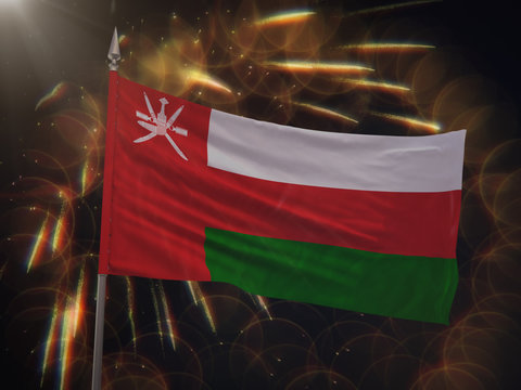 Flag of Oman with fireworks display in the background
