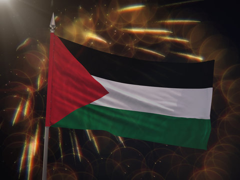 Flag of Palestine with fireworks display in the background
