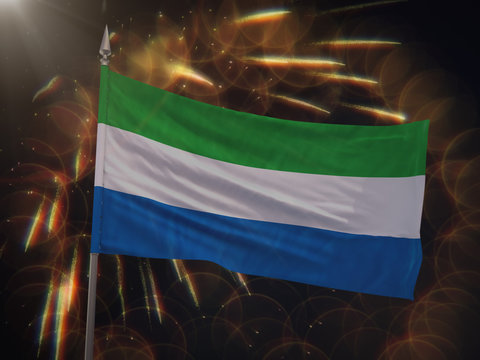 Flag of Sierra Leone with fireworks display in the background