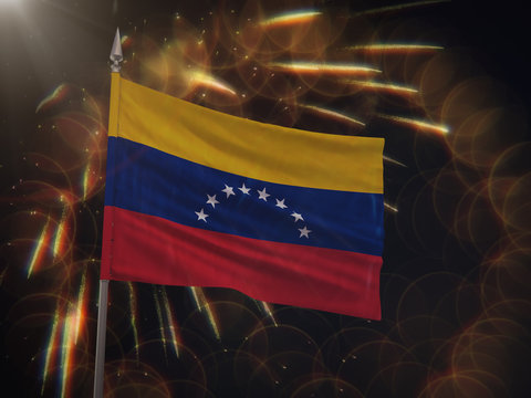 Flag of Venezuela with fireworks display in the background