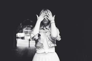 Concept of depression is despondency and sadness. Problems with women. The concept of fear and horror. Lonely sad simple woman in confusion 