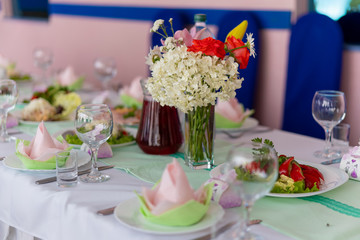 A bouquet of flowers on a festive table