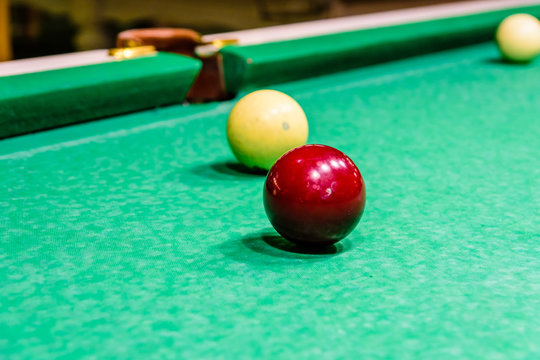 Balls on the green cloth. Russian billiard