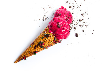 Cherry ice cream scoops in a cone