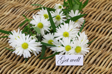 Get well card with daisy flowers on wicker tray
