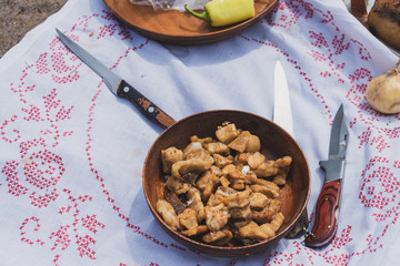 pork cracklings in wooden bowl,serbian cvarci