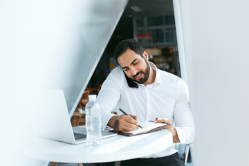 Business Man Talking On Mobile Phone