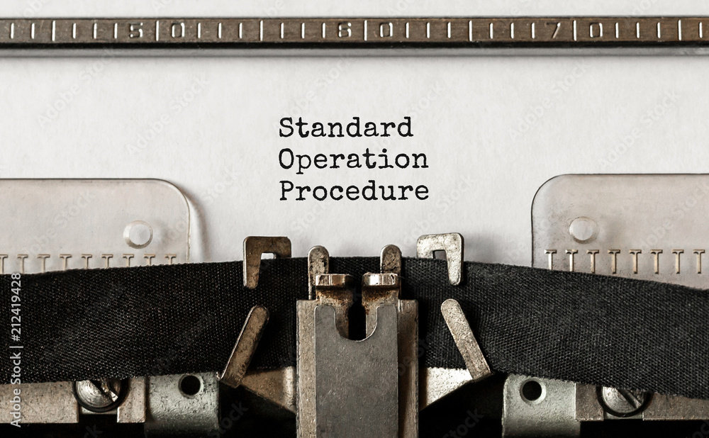 Poster text standard operation procedure typed on retro typewriter