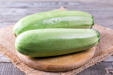 Courgettes zucchini on cutting board