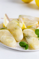 Honey and  lemon ice lolly with fresh citrus juice