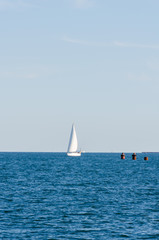 Obraz premium Seascape with white yacht on the sea in Odesa