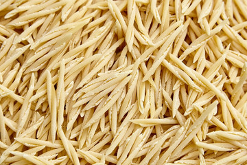 Dry Uncooked Trofie Italian Pasta . Food Background