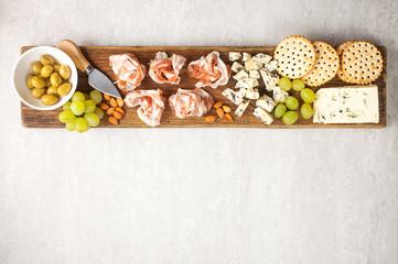 Cheese, bacon, olives and crackers