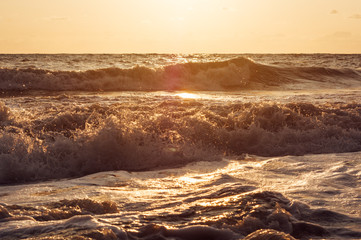 Amazing sea sunset, the sun, waves, clouds