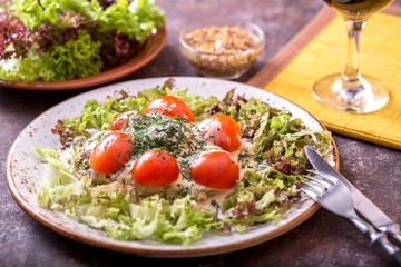 Baked pork with cherry tomatoes in sauce