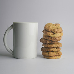 Cookies stack and white mug