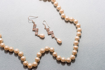 Jewelry accessories in box and table, close-up