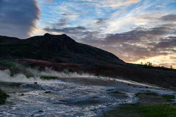 Hot thermal water pool in the Geysir park, Iceland