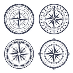Vintage sea compass. Retro east and west, north and south arrows. Navigation compasses with rose of wind isolated vector set © Tartila