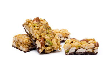 Nut bar with chocolate isolated on white background