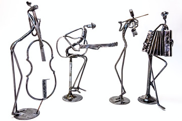 Creative figures of musicians, violoncellist, guitarist, violinist and accordionist are playing...