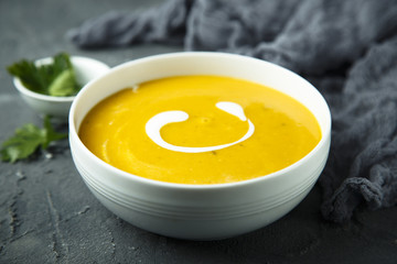 Homemade pumpkin soup with cream